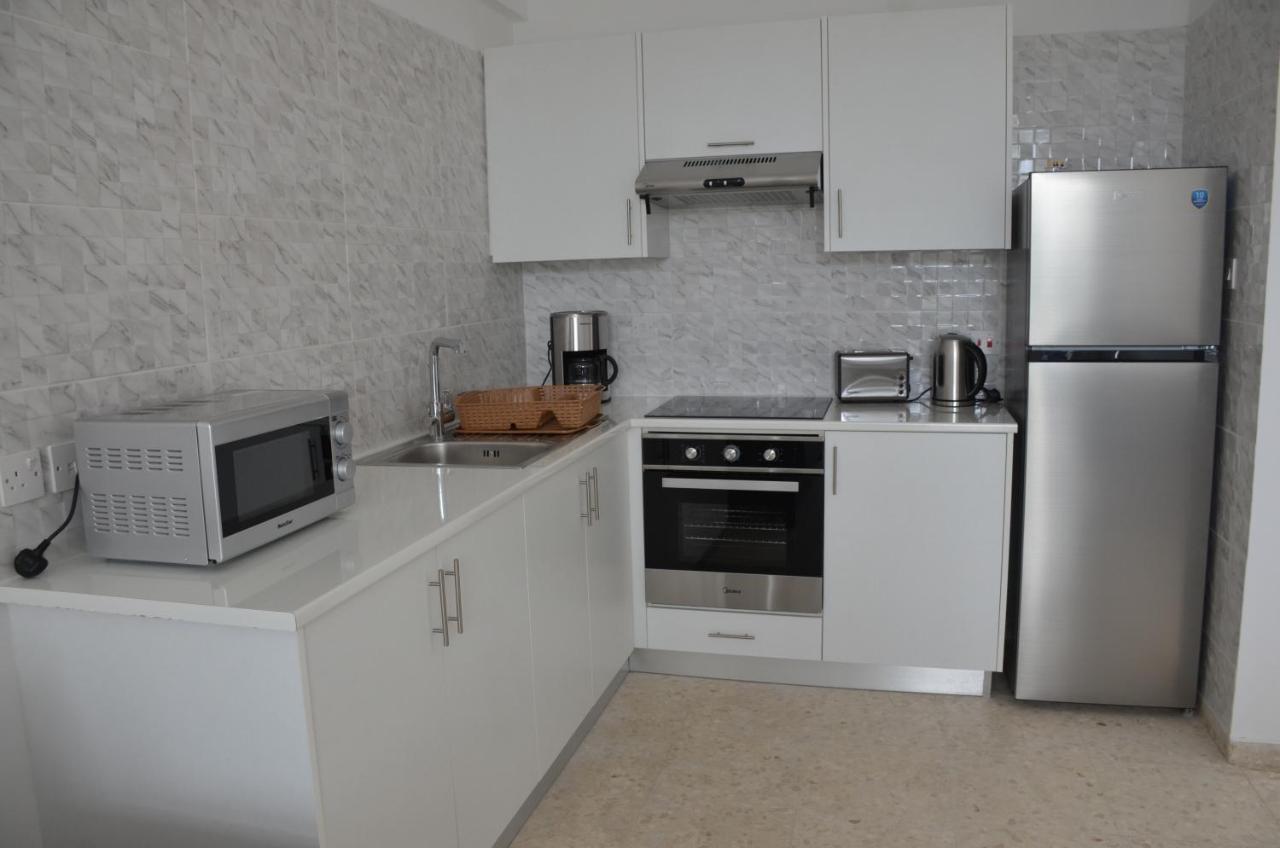 Almyria Apartments - By Imh Travel & Tours Paphos Bagian luar foto